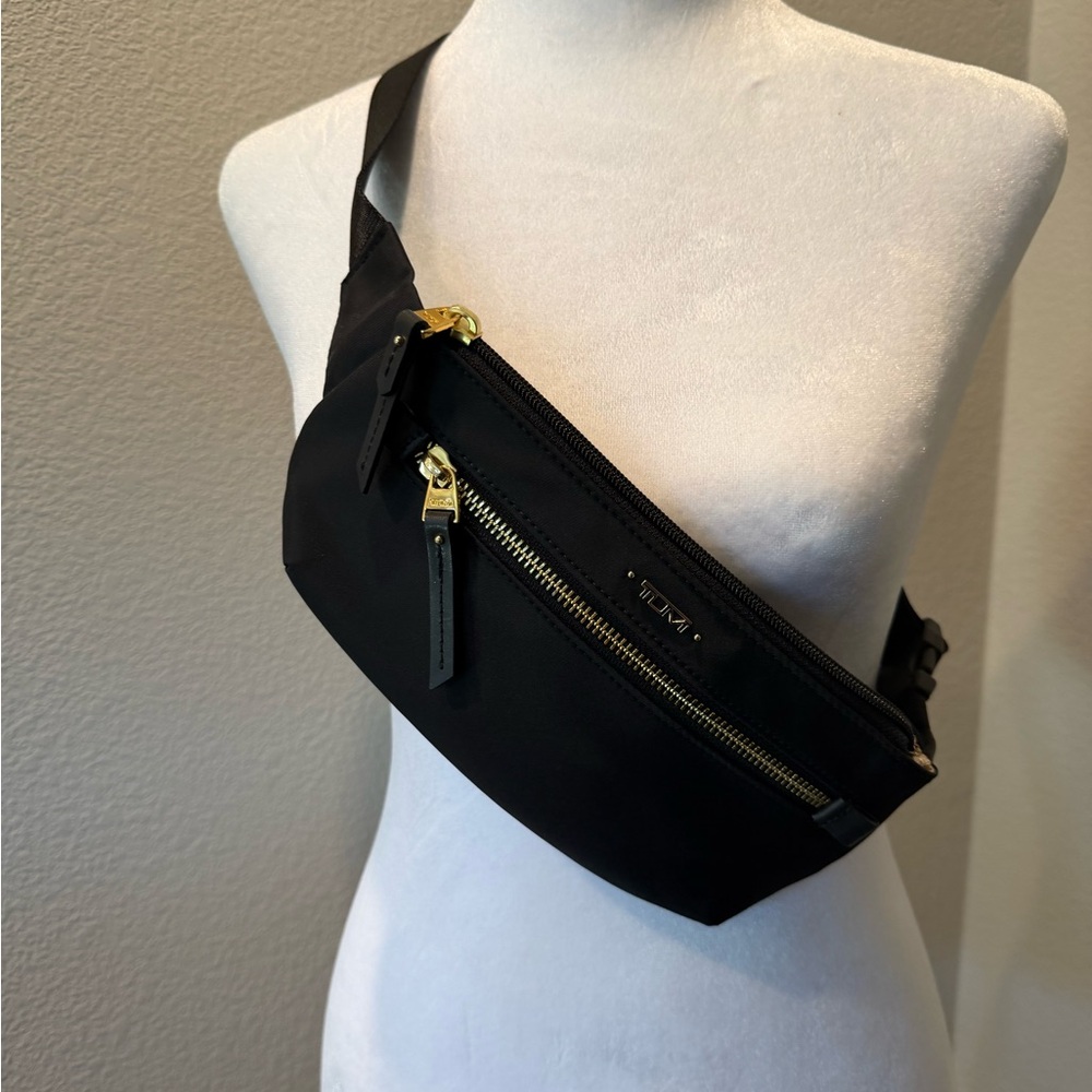 Tumi Black Crossbody Belt Bag with Gold Hardware Accents